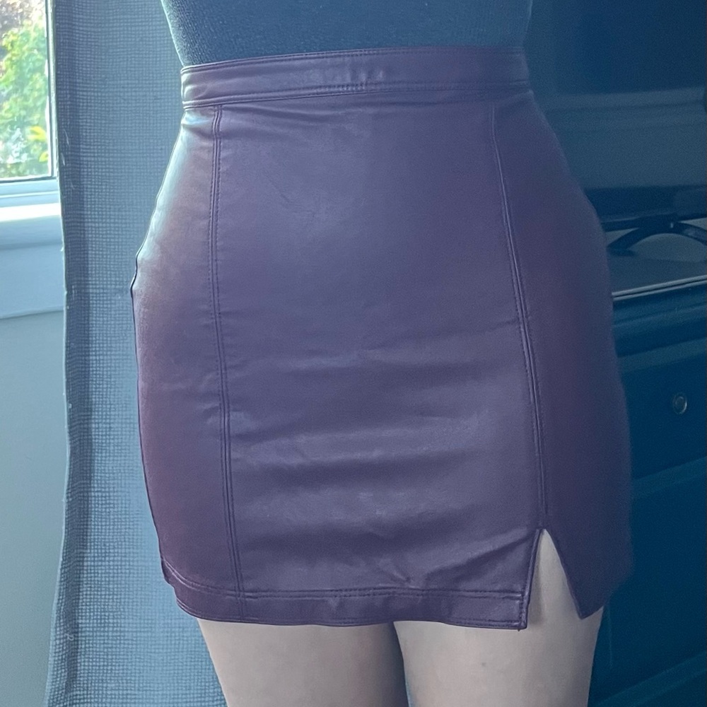 Mini leather skirt with a zipper on the back